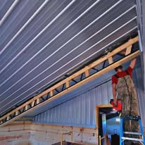 Metal-building roof construction