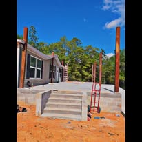 Concrete steps and porch posts